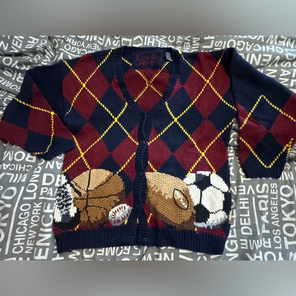 Vintage woman’s sports themed cardigan.